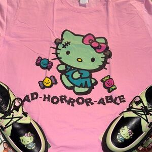 Worn 2x’s Pink Hello Kitty Halloween Frankenstein T-Shirt. 100% Cotton.